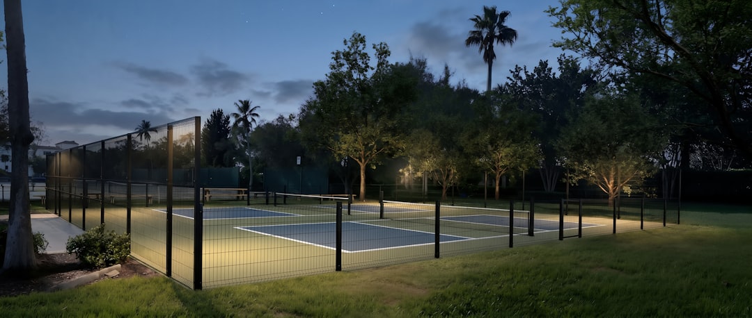 LED court lighting installed for evening backyard pickleball play