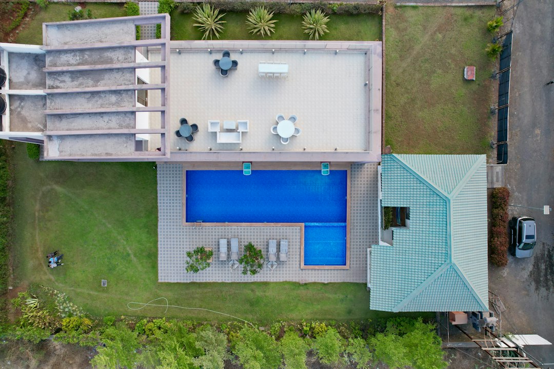Aerial view of a backyard property being planned for a custom pickleball court design