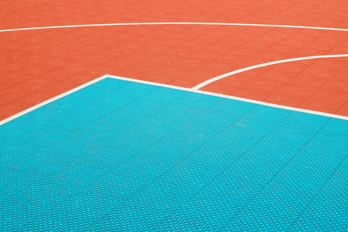 Detail of a basketball court surface and painted key area
