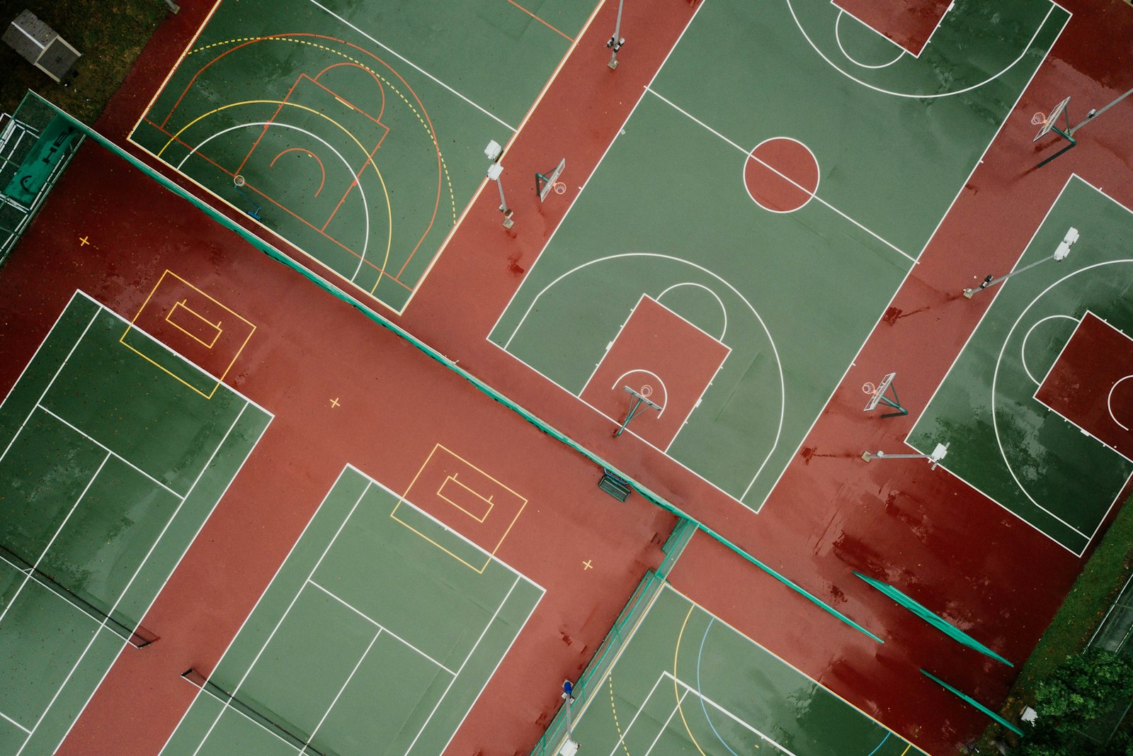 Bird's eye view of a backyard court showing regulation playing area and total footprint