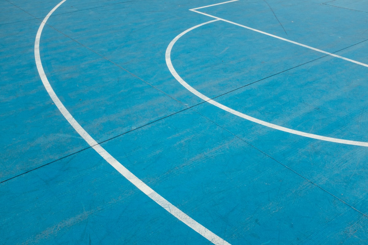 Freshly painted pickleball court lines after a resurfacing repair