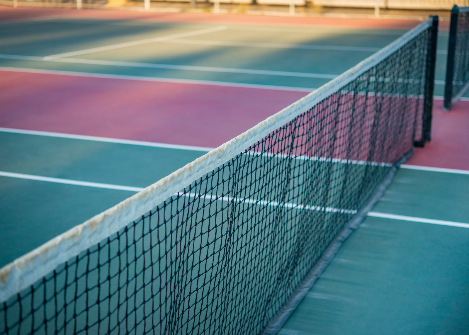 Tennis and pickleball equipment side by side showing key differences between the two sports